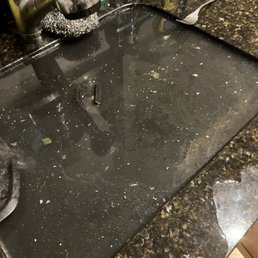 Before with old faucet and backed up sink Before with old faucet and backed up sink