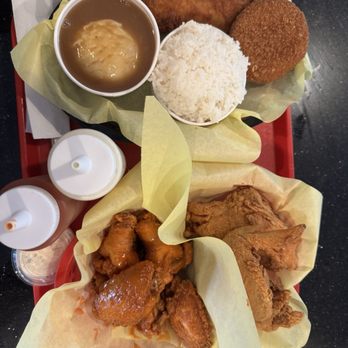 The Chicken Shop - Krappy cake, one cod, mash potato and rice plate. 2 piece white chicken, 5 wet wings - Chicken Shop Near Me - Santee, California