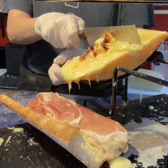 Baked Cheese Haus - Jambon Cru sandwich that has melted Alpine cheese racletted scraped over cured ham - Cheese Shops Near Me - New York, New York