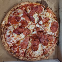 Domino's Pizza - Hot honey pepperoni Pizza. If you look closely at the surface you can notice the subtle add on. Neat. Slightly more interesting way to go.