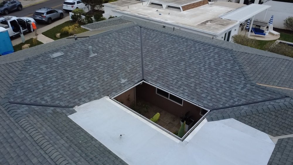 Slide of Vigil's Roofing