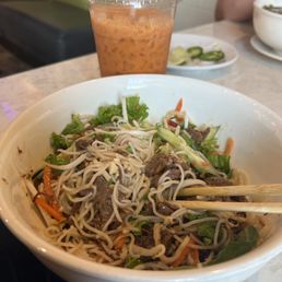 Milk tea and lemongrass beef with vermicelli. Milk tea and lemongrass beef with vermicelli.