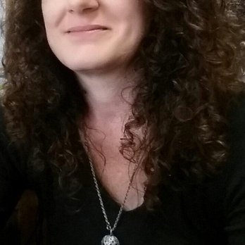 Maple Leaf - a woman with curly hair - Grocery Near Me - Jackson, Tennessee
