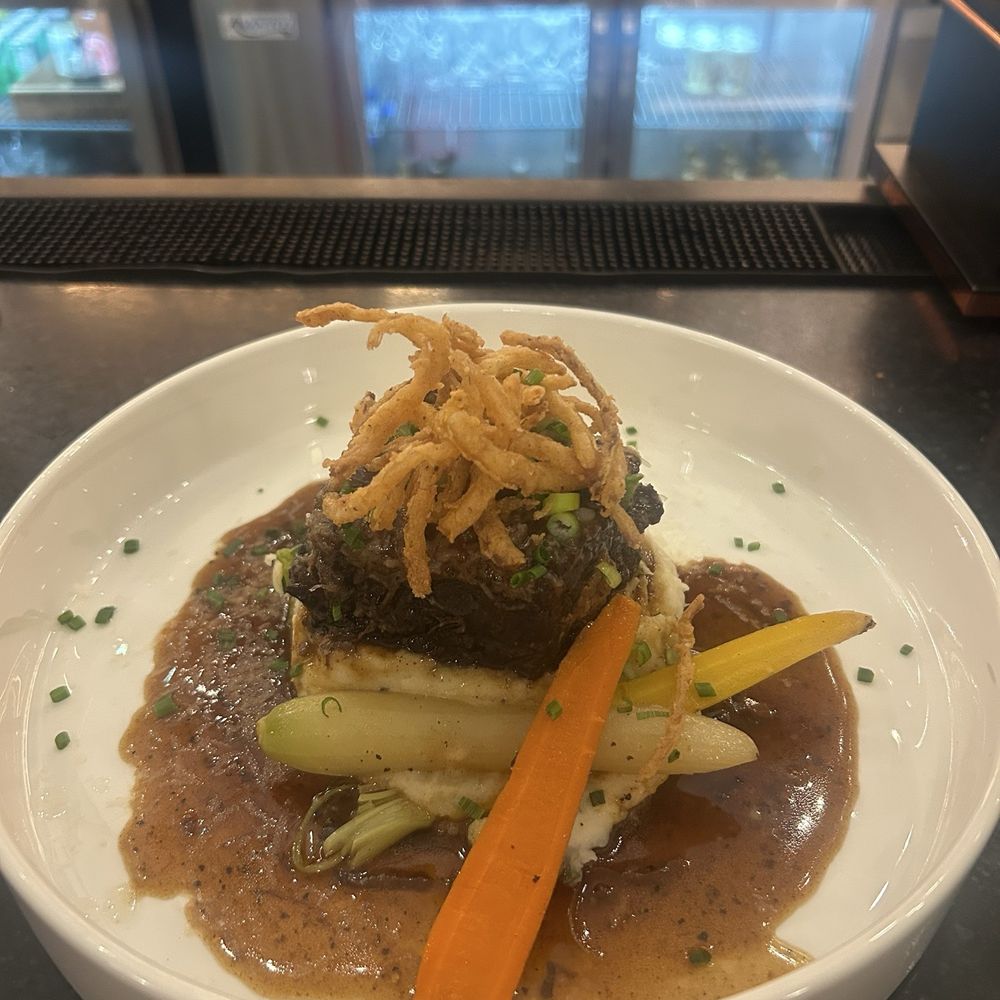 Sticks N Stones - Red Wine Braised Short Rib with roasted garlic whipped potatoes, glazed baby carrots, crispy onions & braising jus. - Cocktail Bars Near Me - Hoover, Alabama Sticks N Stones - Red Wine Braised Short Rib with roasted garlic whipped potatoes, glazed baby carrots, crispy onions & braising jus. - Cocktail Bars Near Me - Hoover, Alabama