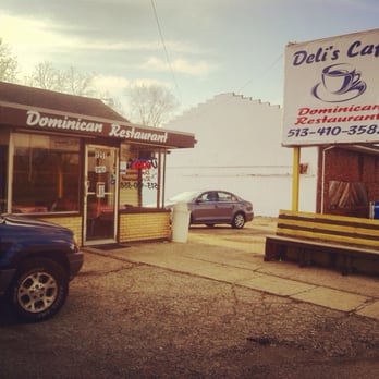 Deli's Cafe - a car parked in front of a deli's cafe - Dominican Near Me - Hamilton, Ohio