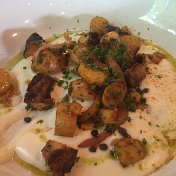 FlatIron Kitchen & Taphouse - Grilled octopus w/ potatoes & onions... - New American Near Me - Davidson, North Carolina