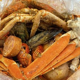 Snow crab combo #4 with Cajun garlic butter. Snow crab combo #4 with Cajun garlic butter.