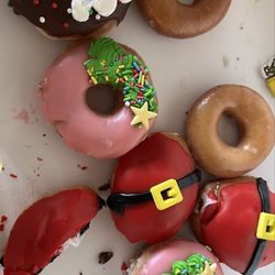Krispy Kreme - Krispy Kreme is festive with holiday doughnuts! They are so good !