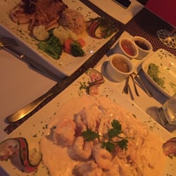 La Chaya - 1- Red Snapper with steamed veggies. 2- shrimp fettuccine, 3 cheese sauce, grilled zucchini & tomatoes. Yummy!