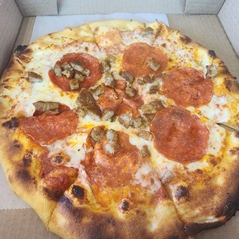 McDonald's - Wood fire pizza, with pepperoni and sausage - Burgers Near Me - Orlando, Florida McDonald's - Wood fire pizza, with pepperoni and sausage - Burgers Near Me - Orlando, Florida