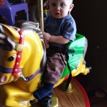Perfect Games - My 15 month old on the merry go round awesome you can buckle your little one on! - Pizza Near Me - Ames, Iowa