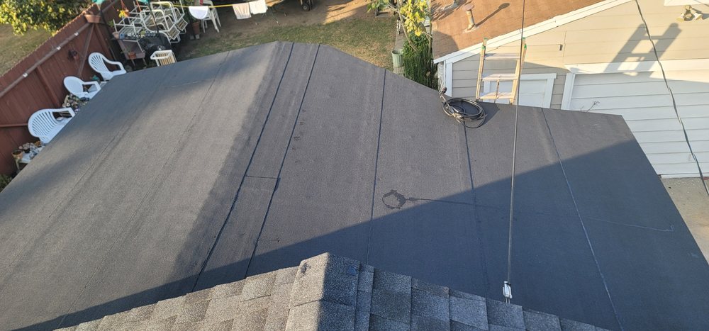 Slide of Global Roofing