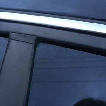 Firehouse Window Tint - See bubbles in the corner and along the side. They're also in the center of the windows. - Auto Glass Services Near Me - Jacksonville, Florida Firehouse Window Tint - See bubbles in the corner and along the side. They're also in the center of the windows. - Auto Glass Services Near Me - Jacksonville, Florida