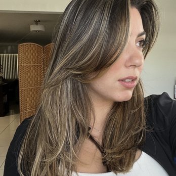 Axelle Salon - Most recent haircut (May, 2023) bright highlights all throughout, long layers with curtain bangs. Nikki delivered AS ALWAYS - Hair Stylists Near Me - Davie, Florida