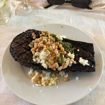 Chef David Schatzle - Roasted Zaatar eggplant with pine nuts and feta cheese - Personal Chefs Near Me Chef David Schatzle - Roasted Zaatar eggplant with pine nuts and feta cheese - Personal Chefs Near Me