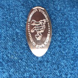 Northwoods Sport & Gift Shop - They have a machine that makes "Turtle Race" coins