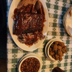 Sampler platter: brisket, ribs, pulled pork, baked beans, fried okra