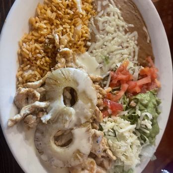 El Lago - Pollo Costeno.  Sliced, grilled chicken breast with shrimp and pineapple. Rice, beans, and guac salad on the side. Served with tortillas. - Mexican Near Me - Branson West, Missouri