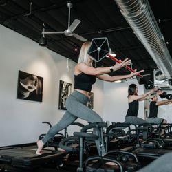 Burn Lagree - Elevator lunge with upper body work to elevate heart rate....