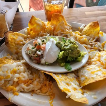 Parrando’s Tex-Mex Grill - Nachos. Refried beans are under all the cheese. No jalapeños. - Tex-Mex Near Me - Haymarket, Virginia Parrando’s Tex-Mex Grill - Nachos. Refried beans are under all the cheese. No jalapeños. - Tex-Mex Near Me - Haymarket, Virginia