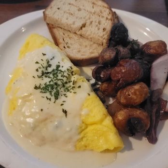 Central Kitchen + Bar - Omelette and potatoes - Gastropubs Near Me - Detroit, Michigan Central Kitchen + Bar - Omelette and potatoes - Gastropubs Near Me - Detroit, Michigan