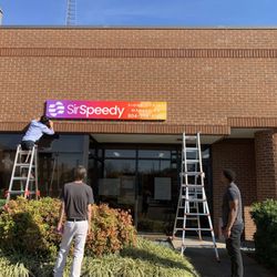 Sir Speedy - Putting up our new sign