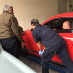 Royal Motors - It shouldn't take 4 people to put a wheel on a car