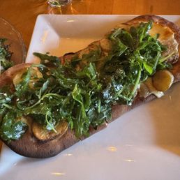 Australian crescent potatoes, caramelized onions, bechamel, smokey scmorza cheese, arugula. Australian crescent potatoes, caramelized onions, bechamel, smokey scmorza cheese, arugula.