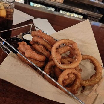 Citizen Burger Bar - Onion rings appetizer with house ranch and house bbq sauce for dipping - Burgers Near Me - Charlottesville, Virginia Citizen Burger Bar - Onion rings appetizer with house ranch and house bbq sauce for dipping - Burgers Near Me - Charlottesville, Virginia