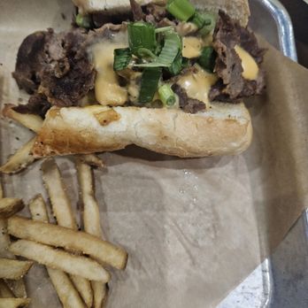 Buffalo Wild Wings - Beer cheese cheese steak with fries. - American Near Me - Elyria, Ohio