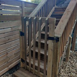 Gate perfectly matches the stair railings Gate perfectly matches the stair railings