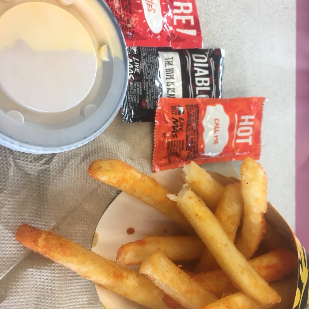 Nacho fries. Fries with Doritos Nacho Cheese-like coating. Comes with a side of nacho cheese. Would come back and get a large. Nacho fries. Fries with Doritos Nacho Cheese-like coating. Comes with a side of nacho cheese. Would come back and get a large.