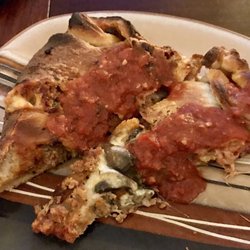 Sam's Laroma Pizza House & Restaurant - 1/2 of a calzone. Delicious!