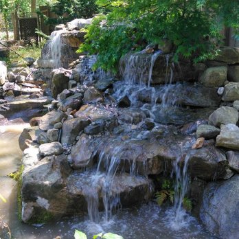 Garden Ninjas - Waterfall installed and maintained to enhance the garden. - Landscaping Near Me - Apex, North Carolina Garden Ninjas - Waterfall installed and maintained to enhance the garden. - Landscaping Near Me - Apex, North Carolina