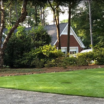 Think Green Lawn Service - a house in the background - Pest Control Near Me - Cumming, Georgia Think Green Lawn Service - a house in the background - Pest Control Near Me - Cumming, Georgia