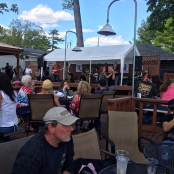 Driftwood Bar & Grill - a large group of people sitting outside - Burgers Near Me - Newaygo, Michigan Driftwood Bar & Grill - a large group of people sitting outside - Burgers Near Me - Newaygo, Michigan