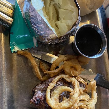 Cinders Charcoal Grill - a steak and onion rings - Burgers Near Me - Appleton, Wisconsin