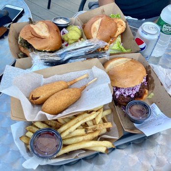 LBK Grill - Pictured: Corn dogs, fries, the Marinated Grilled Chicken Sammich, the Chimmichurri Chicken Sammich, and the Pulled BBQ Beef Brisket. - Burgers Near Me - Long Branch, New Jersey