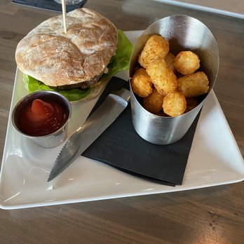 Carson Kitchen - Butter Burger with a side of spicy tater tots - New American Near Me - Salt Lake City, Utah