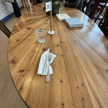 Ellie's - Communal table with cook books. - Breakfast & Brunch Near Me - Providence, Rhode Island Ellie's - Communal table with cook books. - Breakfast & Brunch Near Me - Providence, Rhode Island