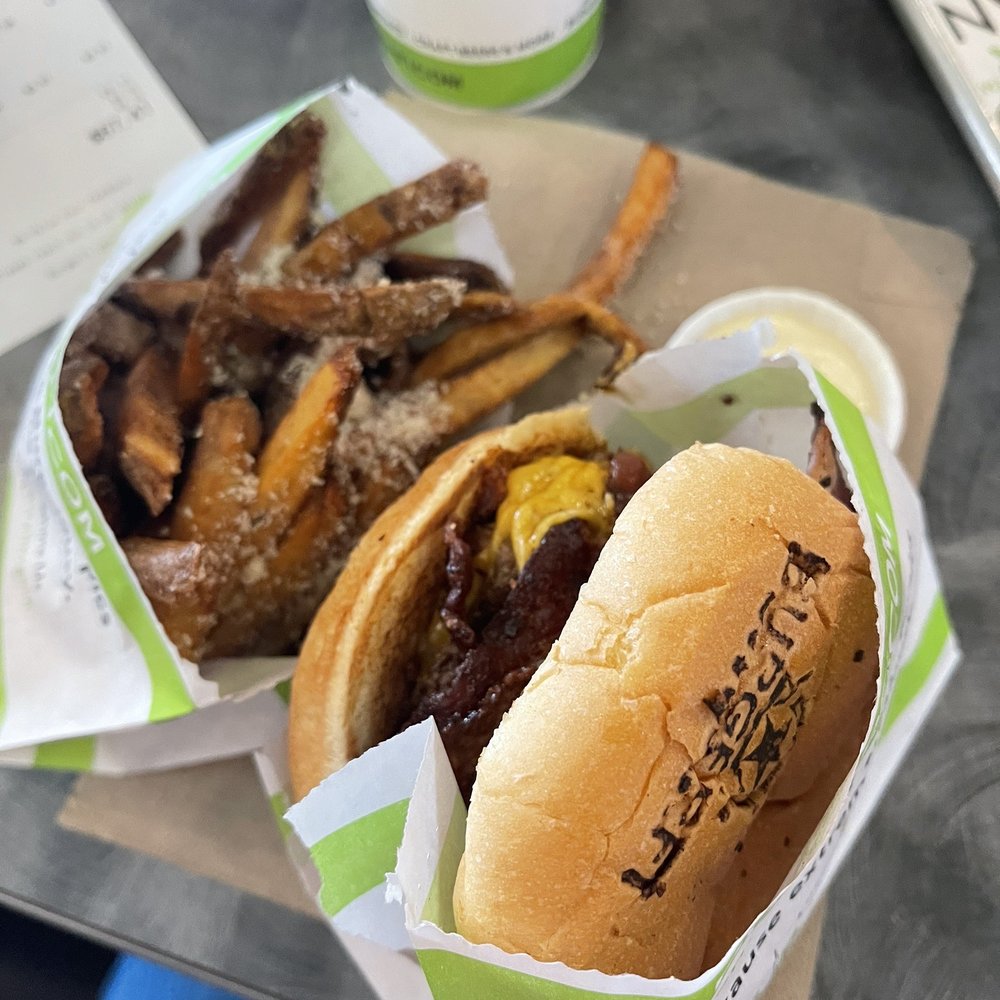 Ultimate bacon burger and truffle fries. Ultimate bacon burger and truffle fries.
