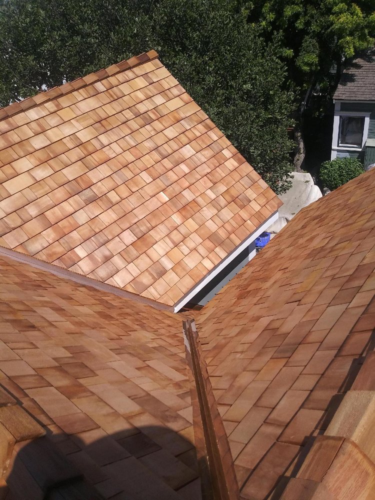 Slide of Father And Son Roofing.