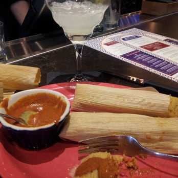 Uncle Julio's - Pulled pork tamale and chicken tamale featuring creamy red salsa freshly made in house. - Mexican Near Me - Skokie, Illinois Uncle Julio's - Pulled pork tamale and chicken tamale featuring creamy red salsa freshly made in house. - Mexican Near Me - Skokie, Illinois