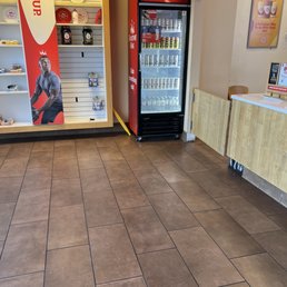 Inside the store. They sell Celsius drinks.