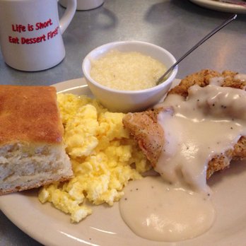 Norma's Cafe - The country breakfast with chicken fried chicken, scramble eggs, grits and a homemade biscuit. All was delicious besides the grits. - American Near Me - Dallas, Texas