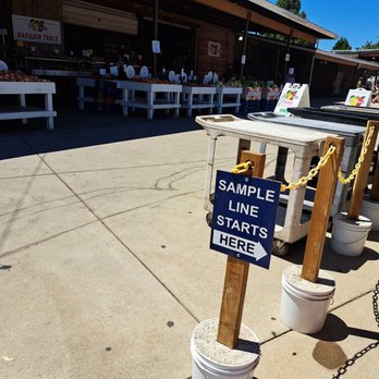 Boa Vista Orchards - Start of the Sample Line. Bargain Table in background. - Fruits & Veggies Near Me - Placerville, California Boa Vista Orchards - Start of the Sample Line. Bargain Table in background. - Fruits & Veggies Near Me - Placerville, California