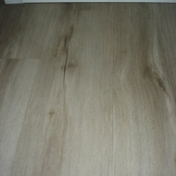 Happy Home Construction - New flooring in living room - General Contractors Near Me