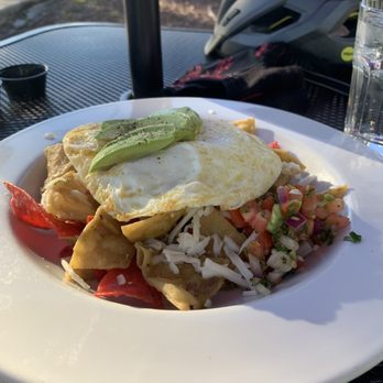 Evarista’s Comal Restaurant - Green sauce Chilaquiles with two over medium fried eggs. Delicious - New American Near Me - Capitola, California Evarista’s Comal Restaurant - Green sauce Chilaquiles with two over medium fried eggs. Delicious - New American Near Me - Capitola, California