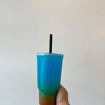 West Park Nutrition - a hand holding a blue drink - Juice Bars & Smoothies Near Me - Cleveland, Ohio West Park Nutrition - a hand holding a blue drink - Juice Bars & Smoothies Near Me - Cleveland, Ohio