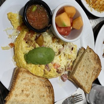 Off Street Cafe - You can see just how small the fruit cup is cuz you know how small a small container of salsa is. - American Near Me - Cerritos, California